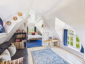 Bedroom 5 & seating area - click for photo gallery